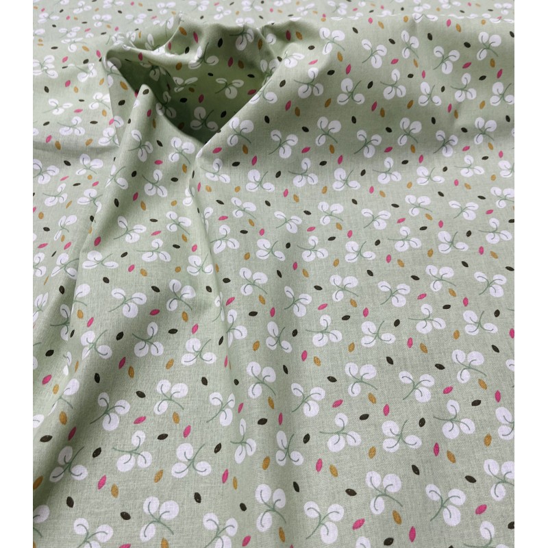 Coton 150 -Fleurs fond amande.