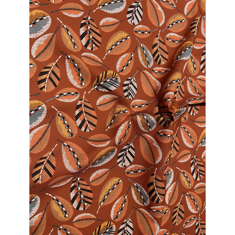 Tissu toile extérieure Plumette terracotta.