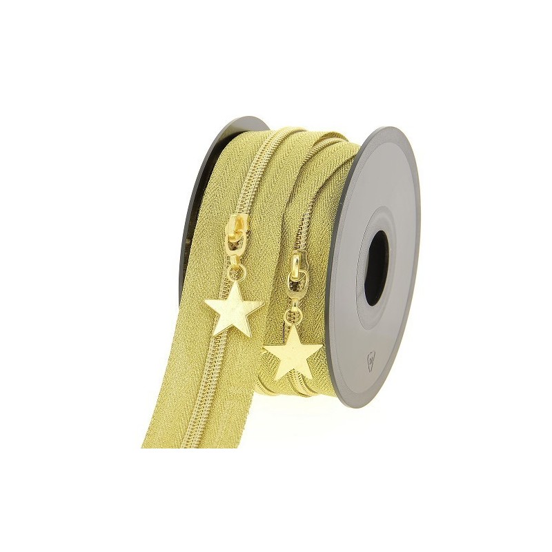 Mercerie - Fermeture éclair au mètre doré etoile